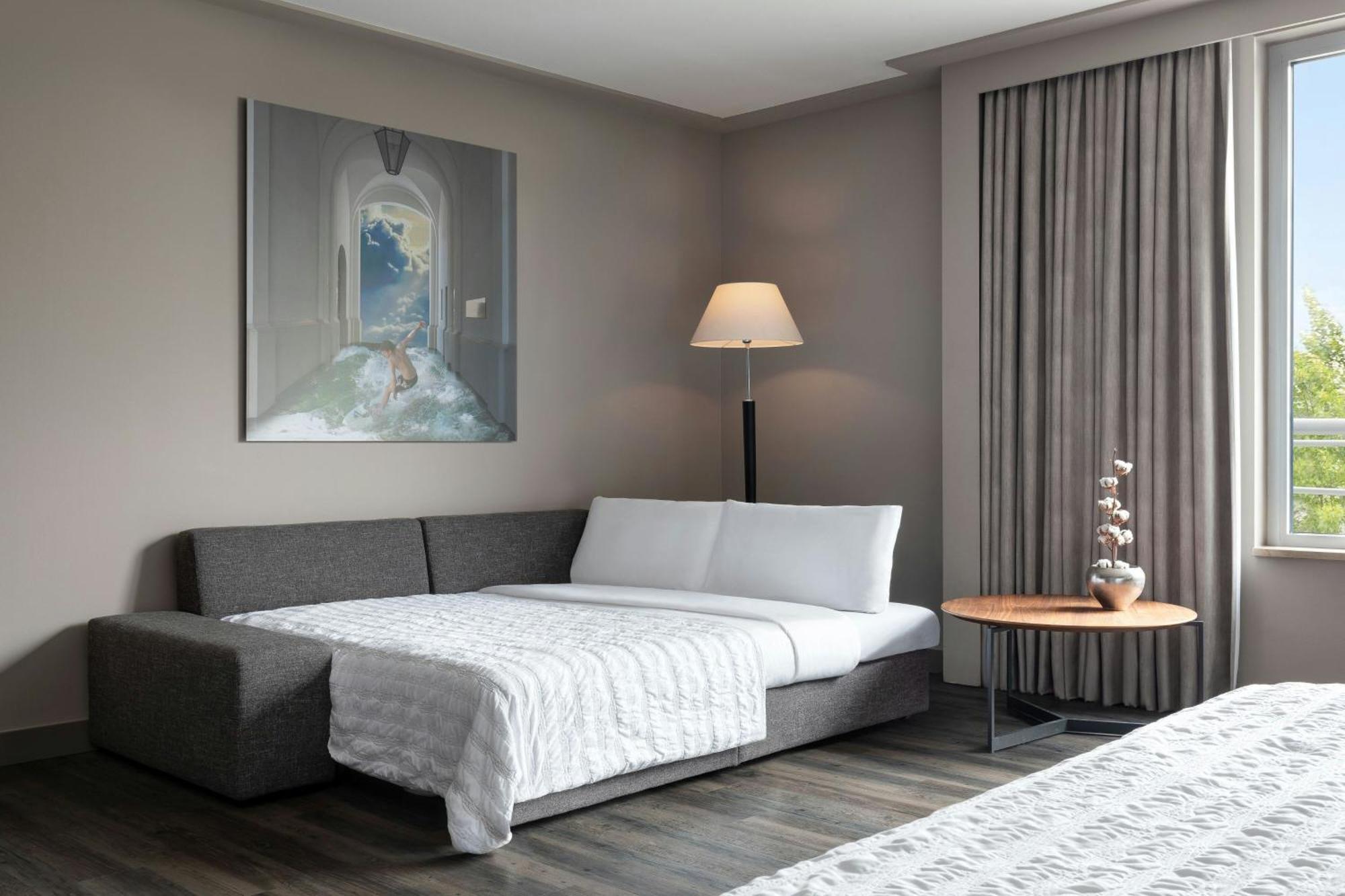فندق لو ميريديان ميونيخ المظهر الخارجي الصورة A sofa bed